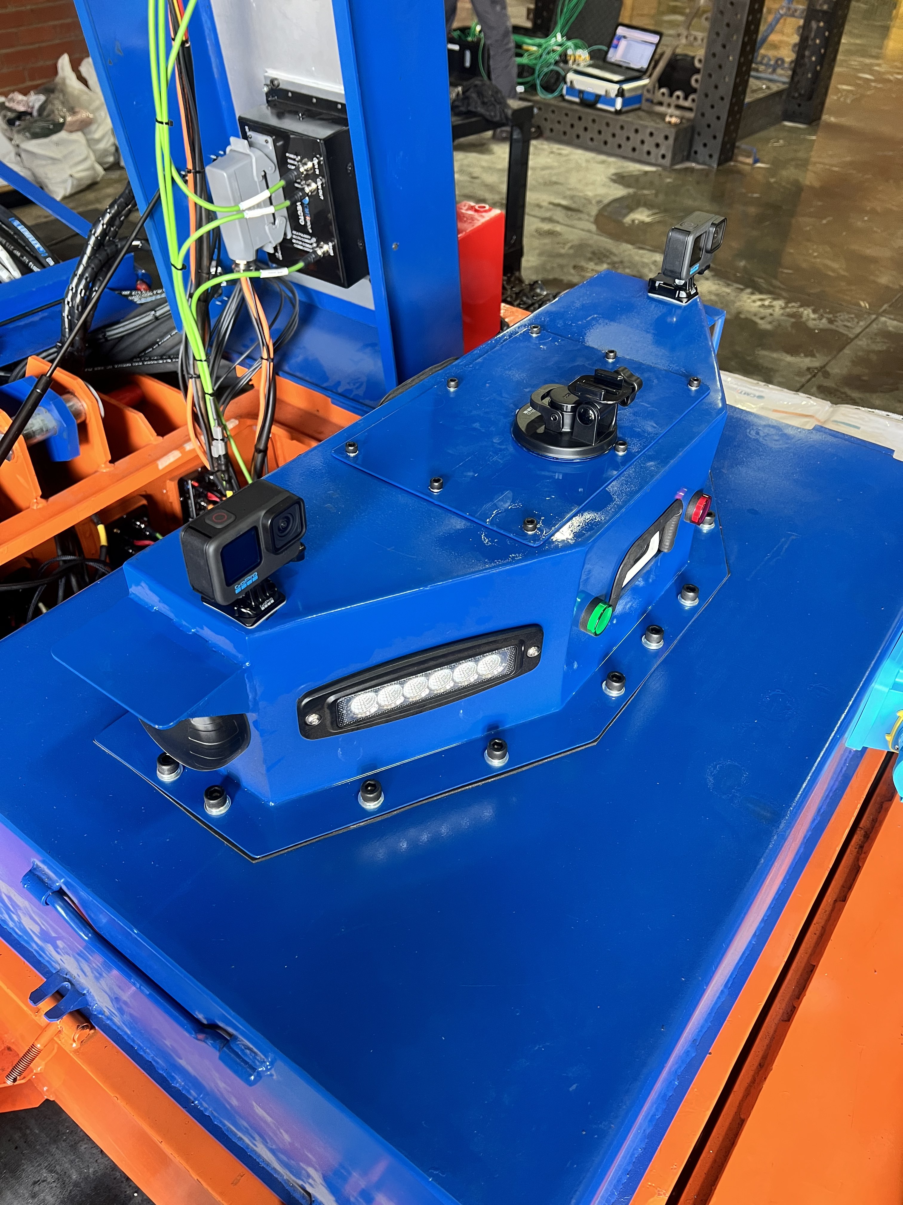 Blue calibration fixture used during controlled CMTI instrumentation testing