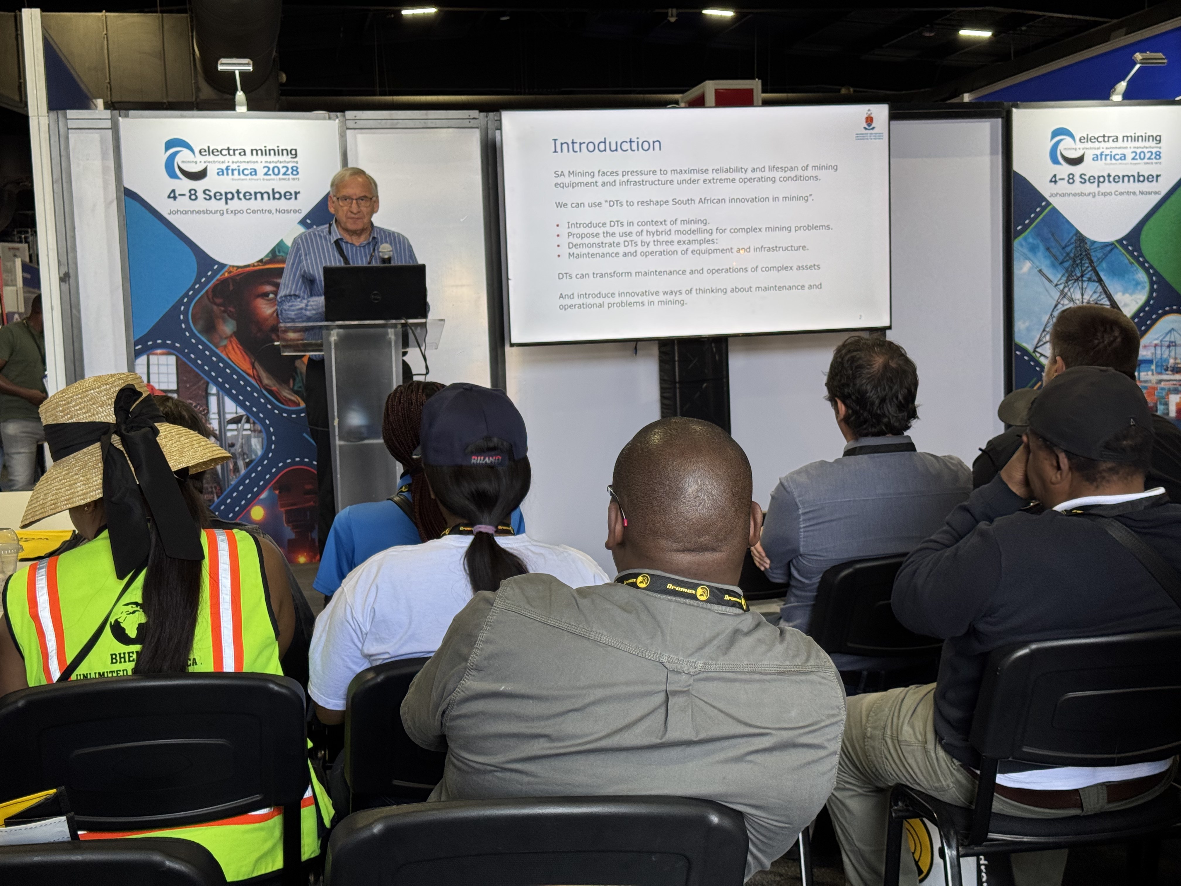 Professor Stephan Heyns presenting to delegates seated in the Electra Mining theatre